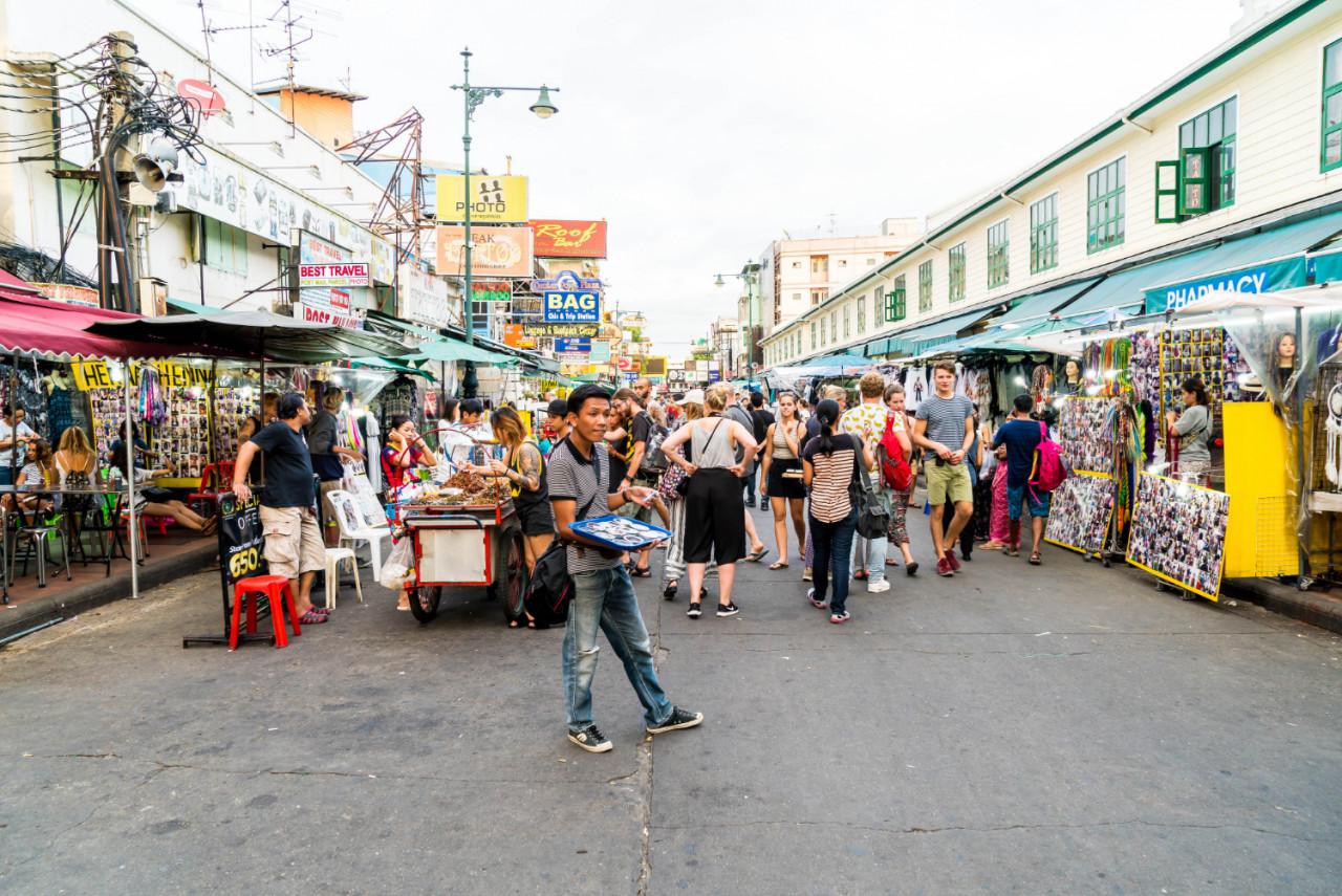 tourists locals walk along popular backpacker destination khaosarn
